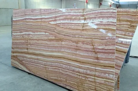 سنگ مرمریت شکلاتی یزد با رنگ گرم برای نمای ساختمان